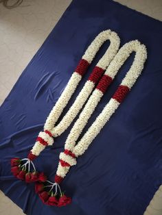 the flowers are arranged on the blue cloth