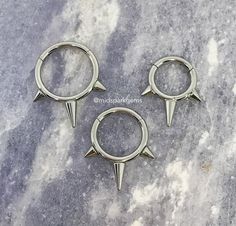 14G Triple Spike Hinged Segment Ring Titanium Clicker ASTM | Etsy Bijoux Piercing Septum, Septum Piercing Jewelry, Nostril Ring, Spike Ring, Pretty Jewelry Necklaces, Plug Earrings, Septum Jewelry, Titanium Jewelry, Gauged Earrings