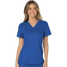 Workwear Revolution | Mock Wrap Nurse Shirt Join the Workwear Revolution with modern, soft, affordable, and oh-so-comfortable nursing scrubs. Uniform scrubs for women enter a new era of ultra-soft, reliable, durable and easy-care options with Cherokee Workwear Revolution. Soft tri-blend fabric is paired with functional utility details for an updated look and feel you'll love. The two-way stretch poly/rayon/spandex fine twill fabric blend feels soft and smooth to the touch. The breathable and eas Loop Logo, Stylish Scrubs, Womens Scrub Tops, Cherokee Woman, Scrubs Uniform, Nurse Uniform, Womens Scrubs, Scrubs Nursing, Nursing Clothes