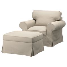 a chair with a footstool and ottoman