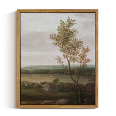 an old painting hanging on the wall with a tree and farm scene in the background