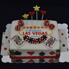 a las vegas themed birthday cake with playing cards on it