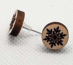 These little snowflake stud earrings are the perfect gift for the winter lover in your life. These cute wood earrings are lightweight and versatile enough to add a nice touch to any outfit. Details... one set of earrings Basswood  laser cut  stud earrings  .5 inches in diameter sterling silver posts rubber back Free gift wrapping upon request. This set is handmade. Because of this, there may be slight variances from included photos. Do not submerge in water (showering, swimming, etc.). These are Glowforge Jewelry, Laser Studio, Snow Earrings, Wood Jewelery, Laser Cut Wood Earrings, Wood Earrings Stud, Winter Schnee, Laser Ideas, Laser Engraved Ideas