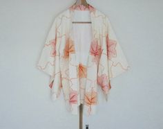 ⚠️Please check our shop announcement first ⚠️SUPER GORGEOUS!!!Vintage Japanese Kimono Jacket - Haori -**********************************************Item no. H21-75Highly Recommended!!!Modern HaoriThis Vintage Japanese Shibori Kimono " Haori "  is a Japanese coat usually worn over kimono. Perfect any season. This Haori features Gorgeous Orange Japanese leaf pattern in beautiful ivory Silk 100% Shibori fabric. very stunning!  They are entirely hand tailored. It can be closed by a pair of strings ( Handmade White Kimono For Spring, Spring White Handmade Kimono, Handmade White Kimono With Kimono Sleeves, Haori Pattern, Japanese Coat, Vintage Kimono Jacket, Japanese Jacket, Silk Kimono Jacket, Japanese Shibori