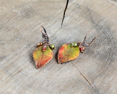 "Autumn leaf earrings Autumn jewelry Fall leaves jewelry Woodland earrings Fall wedding jewelry Gift for women Gift for her Autumn colors leaf size about 1\" (2,5cm) Please, keep the jewellery away from perfume and other alcohol containing fluids because the alcohol damages the Polymer clay. Store the fragile items in separate boxes and treat them with care. Misuse may result in damage. Visit my shop https://www.etsy.com/shop/JewelryByCompliment?ref=l2-shopheader-name If you have any questions, Fall Wedding Jewelry, Leaves Jewelry, Woodland Earrings, Autumn Jewelry, Bead Making, Earrings Fall, Felt Jewelry, Roxy Women, Autumn Leaf