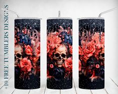 three candles with skulls and flowers on them, both decorated in different colors or designs