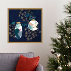 a living room with a christmas tree in the corner and ornaments hanging on the wall