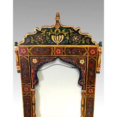 Charming and colourful architectural form hand made folk art frame that is suitable for framing a mirror, photograph or painting which is 16" x 12"..  Can be used in many a room in the house, brightens up areas that need a little colour. No markings. Vintage mid-20th Century Condition is good for age with some minor repair and loss--nothing that effects the aesthetic quality of this whimsical piece. Listed by East2West Furniture Florida. Overall: 26" x 18" x 1". 3.8 pounds. Framing A Mirror, Meenakari Mirror, Handpainted Wood Mirror, Hand Painted Frames Folk Art, Intricate Mirror Frame, Wooden Carving Mirror Frames, Mirror Makeover, Mirror Frame, A Mirror