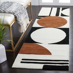 an area rug with various shapes and colors