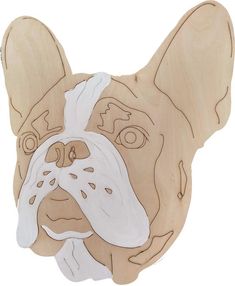 a wooden cutout of a dog's face