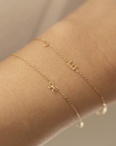 This 14k gold bracelet features a delicate bow, making it ideal for everyday wear. Its petite design is perfect for making a subtle statement. * 14k Yellow Gold * Bow measures approx. 6mm * Same Style Necklace: https://www.etsy.com/listing/1611306083/14k-gold-dainty-bow-necklace-tiny-bow?click_key=9dd688161579bb004abb4ef357dff8734744d24e%3A1611306083&click_sum=7aed8dbc&ref=shop_home_active_3&frs=1&sts=1 ■ SHIPPING UPGRADES You can find shipping upgrades options in the drop bar menu when you chec Minimalist Accessories Jewellery, Delicate Gold Bracelet, Gold Minimalist Jewelry, Preppy Jewelry, Pretty Jewelry Necklaces, Cute Bracelet, Mini Bow, Tiny Bow, Bow Bracelet