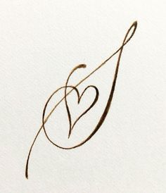 a drawing of a heart on a piece of paper with the word love written in cursive writing