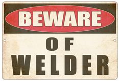 a sign that says beware of welder