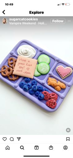 a purple tray filled with different types of food