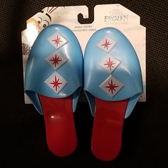 a pair of blue and red shoes with stars on them