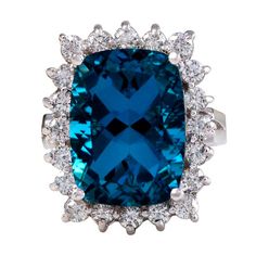 12.90 Carats Natural Impressive London Blue Topaz And Diamond 14k Yellow Gold Ring Suggested Replacement Value Approx. $6,200.00 Total Natural London Blue Topaz Weight: Approx. 12.00 Carats (Heated, Irradiated) London Blue Topaz Measures: Approx. 16 X 12mm Natural Round Diamonds Weight: Approx. 0.90 Carats (Color G-H / Clarity Si1-2) Ring Total Weight: Approx. 7.5 Grams Luxury Blue Cushion Cut Topaz Ring, Luxury Blue Topaz Ring With Prong Setting, Luxury Blue Topaz Ring With Halo Setting, Formal Blue Topaz Ring With Brilliant Cut, Sapphire Diamond Pendant, Blue Sparkles, Yellow Gold Ring, London Blue Topaz, London Blue