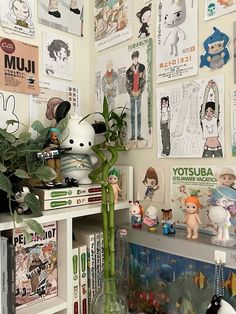 there are many pictures on the wall above the bookshelf and vases with plants in them