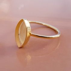 For wholesale quantity and more discount, please send message. This beautiful simple band bezel cup / blank ring is perfect for jewelry making. We offer this beautiful blank setting ring in different gemstone sizes. ** Features ** * Handmade blank ring for setting * Shape - Marquise * Size - 2.5x5 mm to 12x24 mm * Depth - 2 mm * Material- Sterling silver 925 * Available in colours - Silver, Yellow Gold & Rose Gold plating Type of stone setting - Cabochon stones Gold Marquise Ring With Bezel Setting, Gold Marquise Stackable Rings As Gift, Gold Oval Stackable Rings With Smooth Bezel, Handmade Gold Oval Stackable Rings, Simple Band, Stone Setting, Ring Setting, Faceted Gemstones, Ring Ring