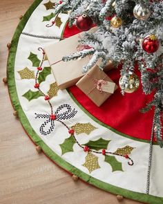 a christmas tree skirt with presents on it