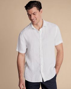 100% linen, Available in classic and slim fit, Classic Collar, Short sleeve, Classic and slim fit: back pleats, Machine washable - Pure Linen Short Sleeve Shirt - White - Pure Linen Short Sleeve Shirt - White | Men's Charles Tyrwhitt Pure Short Sleeve Casual Shirt - White Single Cuff Size Large Linen Classic Linen Tops With Spread Collar, Classic Linen Top With Spread Collar, Classic Unstructured Linen Tops, Fitted Classic Linen Shirt, Classic Relaxed Fit Linen Tops, Relaxed Fit Classic Linen Tops, Classic Solid Linen Shirt, Classic Linen Tops With Relaxed Fit, Fitted Linen Shirt With Spread Collar