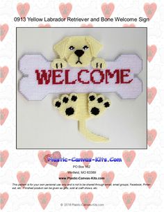 a dog bone with the word welcome on it and two paw prints in front of it