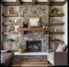 a living room filled with lots of furniture and a fire place in front of a stone fireplace