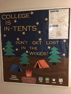 a bulletin board with tents and trees on it that says college is in tents don't get lost in the woods