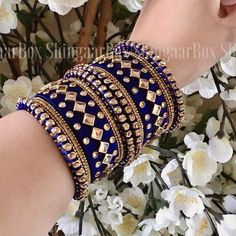 Luxury Traditional Blue Bangle, Bollywood Style Bracelets With Motifs As Gifts, Bollywood Bracelets With Motifs For Navratri, Bollywood Style Bracelets With Motifs For Navratri, Blue Kundan Traditional Party Wear, Traditional Blue Bracelets For Festivals, Blue Bangle As A Festival Gift, Blue Bracelets For Festivals As A Gift, Blue Bracelets For Festivals And Gifts