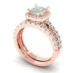 a rose gold engagement ring set with a princess cut diamond center and side stones on the band