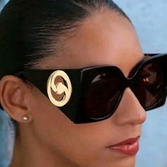 Black Oversized Designer Style Sunglasses With Goldtone Inset. Full Uv Protection. These Glasses Express A Distinguished Comptemporary Spirit With An Eclectic Esthetic With The Goldtone Unique Inset Detail. Features; Frame Shape;Butterfly Frame Material-Acetate Frame Type-Full Rim Lens Feature-Solid Black Color Wipe Clean Imported Comes With Fabric Drawstring Case And Cleaning Cloth. Oversized Black Sunglasses Designer Style Gold Inset Shades Uv Protection Sunglasses Butterfly Shaped Sunglasses Black Retro Sunglasses For Vacation, Retro Black Sunglasses For The Beach, Black Sunglasses With Mirrored Lenses For Fashion, Modern Black Sunglasses For Fashion, Modern Black Sunglasses, Elegant Black Sunglasses For Vacation, Oversized Black Sunglasses, Shape Butterfly, Shaped Sunglasses