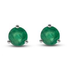 Captivating round natural emerald gemstones shimmer elegantly in the center of these glamorous women's martini stud earrings. Fashioned in 14K white gold, the earrings secure in place with friction backs. Classic Brilliant Cut Emerald Earrings, Formal Earrings With May Birthstone In Round Cut, Emerald Earrings In White Gold, Classic Emerald Earrings With Prong Setting, Round Emerald Earrings For Anniversary, Emerald Round Earrings For Anniversary, Classic Round May Birthstone Earrings, Classic Round Earrings For May Birthstone, Classic Round Cut Emerald Earrings