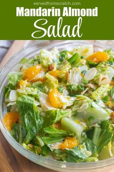 a bowl of a green salad with mandarins and almonds with Pinterest pin text. Recipes With Mandarin Oranges, Mandarine Recipes, Mandarin Salad, Almond Salad, Mandarin Orange Salad, Sandwich Wraps, Mandarin Oranges, Orange Salad, Yummy Salad Recipes