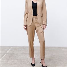 Mid-Waist Trousers With Front Pockets And False Rear Welt Pockets. Featuring Side Vents At The Hems And Metal Hook, Inside Button And Zip Fastening At The Front. Taupe Brown. Brand New With Tags. Full Waist 36” Length 37” Inseam 26” Rise 12” Classic Beige Pantsuit For Work, Classic Fitted Neutral Bottoms, Fitted Neutral Pants With Welt Pockets, Fitted Khaki Pants, Beige Fitted Pantsuit With Straight Pants, Beige Trousers Pantsuit For Office, Beige Fall Workwear Pantsuit, Fitted Beige Pantsuit With Straight Pants, Fitted Khaki Dress Pants For Fall