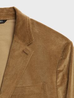 ITALIAN CORDUROY: Soft and textured, this skinny-wale corduroy is perfect for cooler weather.  2-3 BUTTON FRONT: Three-button front is pressed so you can also wear it as a two-button jacket.  SOFTLY STRUCTURED: Minimal padding at the shoulders, unlin Corduroy Blazer With Button Closure, Long Sleeve Corduroy Blazer With Button Closure, Classic Corduroy Outerwear, Corduroy Button-up Blazer For Workwear, Classic Corduroy Business Blazer, Classic Corduroy Blazer For Business, Fitted Corduroy Business Outerwear, Casual Corduroy Blazer With Button Closure, Casual Corduroy Blazer For Business