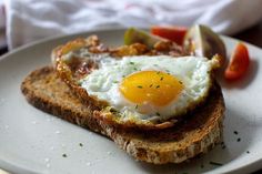 an egg is sitting on top of toast