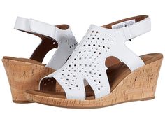 Rockport Briah Hood Sling - Women's Sandals : White : Get your summer flowing in the perforated leather Rockport Briah Hood Sling open-toe wedge sandal. Features on-trend side cutouts and an adjustable hook-and-loop fastener at heel strap. Soft and breathable textile linings. Generously cushioned footbed for added comfort. Cork-wrapped wedge on a durable rubber outsole. Imported. Measurements: Heel Height: 2 1 2 in Weight: 10 oz Platform Height: 1 2 in Product measurements were taken using size Summer T-strap Slingback Sandals With Arch Support, Casual Sandals With Perforations In Synthetic Material, Casual Synthetic Sandals With Perforations, Casual Sandals With Perforations, Casual Summer Sandals With Perforations, Spring Leather Sandals With Perforated Toe, Casual Sandals With Perforated Toe Box For Summer, Synthetic Sandals With Perforations For Summer, Casual Open Toe Sandals With Perforated Toe Box