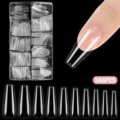 Introducing the TSV 500pcs Long Coffin Nail Tips, which crafted with precision, they offer a sleek, elegant finish, adding a touch of sophistication to your manicure. Whether you're a nail enthusiast or a professional nail technician, these full cover ballerina fake nails are perfect for creating stunning, long-lasting manicures. Say goodbye to the hassle of frequent salon visits and hello to beautiful, salon-quality nails from the comfort of your own home. Size: 7" x 3.8" x 1.2".  Color: Clear. Clear Press On Nails, Nails Clear, Beautiful Salon, Coffin Nails Long, Nail Technician, Professional Nails, Coffin Nails, Stocking Stuffer, Fake Nails