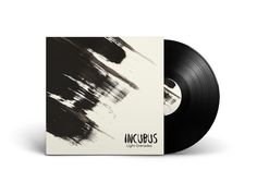 an album with black ink on it and the words incubus written in white