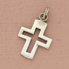 vintage sterling silver cut-out religious cross charm Pre-loved but in great condition - Weight - 1.4g Width - 14mm Length - 20mm Item ID - ABC94400119 Symbolic Sterling Silver Cross Pendant Jewelry, Vintage Silver Cross Jewelry, Sterling Silver Cross Pendant Symbolic Jewelry, Symbolic Sterling Silver Cross Pendant, Antique Silver Symbolic Cross Jewelry, White Adjustable Cross-shaped Jewelry, Vintage Cross-shaped Metal Jewelry, Antique Silver Spiritual Cross Pendant Jewelry, Nickel-free Sterling Silver Cross Charm