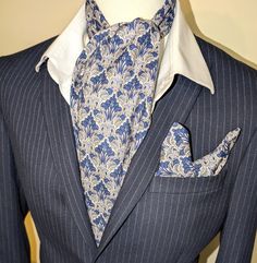 Gorgeous cravat/ascot in Liberty Art Deco print in navy blue, warm grey, and white. Double sided both sides, Liberty's patented Tana Lawn silk like cotton fabric. Hand finished with tiny tailor stitches, I am a trained tailor and started learning as a child taught by my grandmother, a suiting tailor. Measuring to fit necks up to 20 inches wide, total length is a generous 50 inches long and width at the widest point is 6 and 1/2 inches wide. Add the pocket square with no additional postage and £1 Elegant Blue Cotton Ties, Elegant Blue Cotton Suit And Tie Accessories, Classic Blue Cotton Handkerchiefs, Liberty Art, Art Deco Print, Grey Art, Blue And Grey, Tie Accessories, Warm Grey