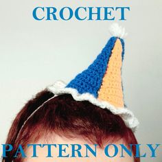 a child wearing a crochet hat with the words pattern only on it's forehead