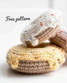 three crocheted donuts stacked on top of each other with the words free pattern