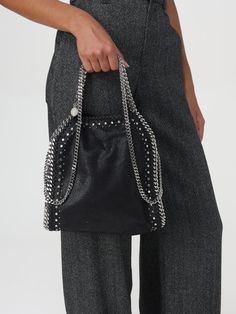 Find STELLA MCCARTNEY Falabella Chain Bag on Editorialist. This Stella McCartney Falabella Chain Bag features a top handle, chain strap, and silver tone hardware. The bag has a flap open closure and is decorated with studs. It can be worn on the shoulder or hand carried. Luxury Silver Bag With Chain Strap, Luxury Silver Bags With Chain Strap, Silver Shoulder Bag With Top Handle And Chain Strap, Luxury Metal Bag With Chain Strap, Luxury Silver Shoulder Bag With Chain Strap, Luxury Metal Bags With Chain Strap, Luxury Silver Shoulder Bag With Chain, Silver Metal Bag With Chain Strap, Metal Shoulder Bag For Evening