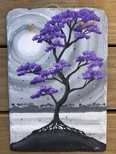 a painting of a tree with purple flowers on it