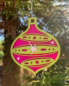 a christmas ornament hanging from a tree