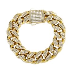 Put some Cuban flavor into your style with this 18mm Cuban link bracelet. It's crafted with high quality gold plating and adorned with cubic zirconia stones for a touch of luxury. The Cuban link design is classic and stylish, and it's sure to make a statement whether you're dressing up or dressing down.This bracelet is the perfect way to add a little bit of edge to your outfit. Whether you're going for a night out on the town or just hanging out with friends, this bracelet will help you make a s Cuban Link Bracelet, Link Design, Cuban Link, Chain Link Bracelet, Shape Patterns, Spring Rings, Gold Plating, Link Bracelets, Prong Setting