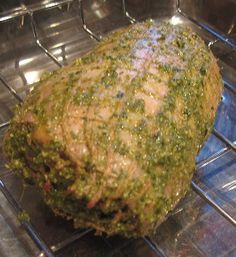 a large piece of food sitting on top of a metal rack in a microwave oven