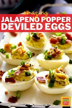 an image of deviled eggs with bacon and green onions in them on a tray