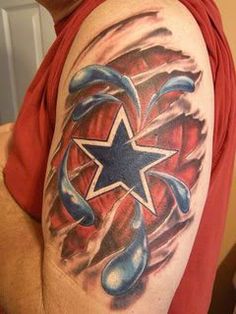 a man with a star tattoo on his arm