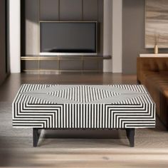 a black and white coffee table in a living room